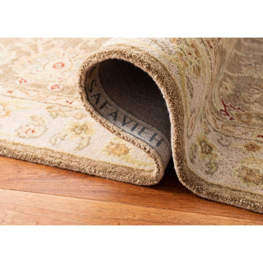 Handmade Tufted Floral Wool 8' x 10' Tan/Ivory Rug