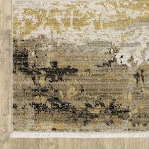4' X 6' Grey Gold Black Charcoal And Beige Abstract Power Loom Stain Resistant Area Rug With Fringe
