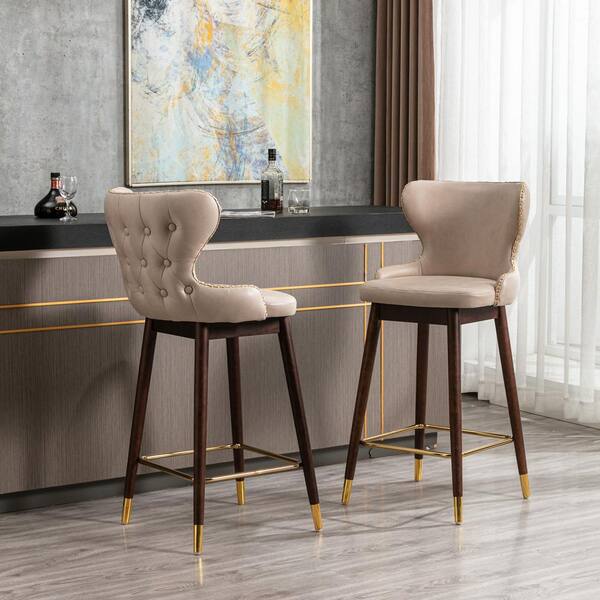 beige leather bar stools with backs