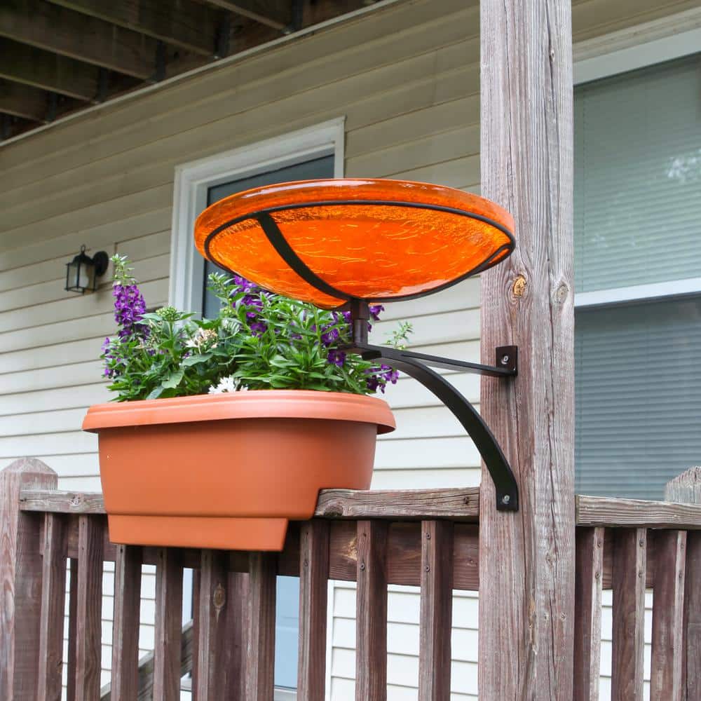 Mandarin Orange Crackle Glass Birdbath with Wrought Iron Wall Bracket