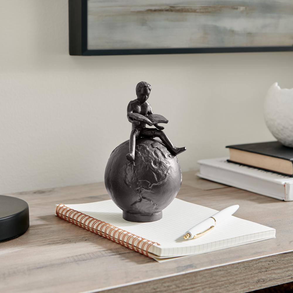 Bronze Cast Iron Boy Reading on Globe Tabletop Sculpture