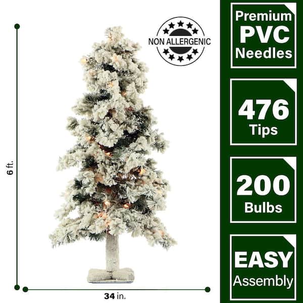 6 ft. Snowy Alpine Snow Flocked Christmas Tree with Lifelike Trunk Base and Clear Lights