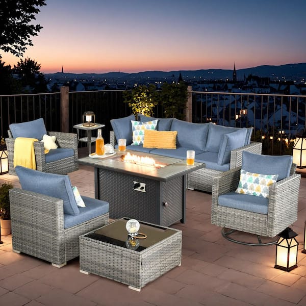 XIZZI Clove 9 Pieces Wicker Outdoor Patio Rectangular Fire Pit Set and Swivel Rocking Chairs with Denim Blue Cushions