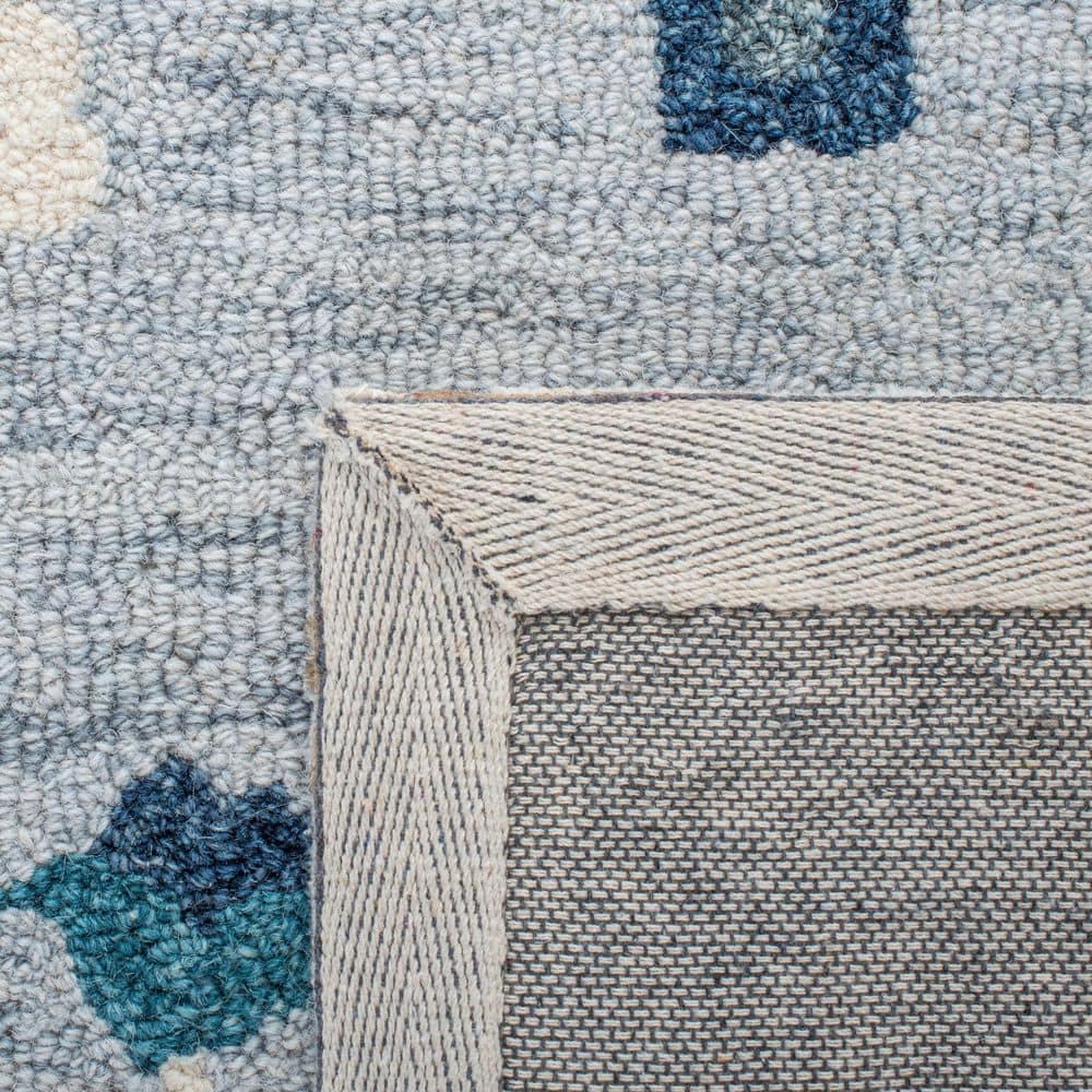 Elegant Azure Bloom Hand-Tufted Wool Rectangular Rug