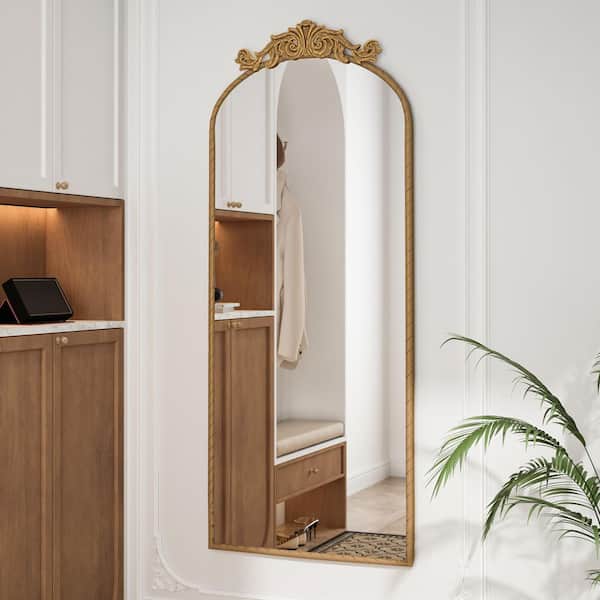 24 in W x 58 in. H Brown Arched Metal Framed Mirror with Vintage Ornate Carved Applique