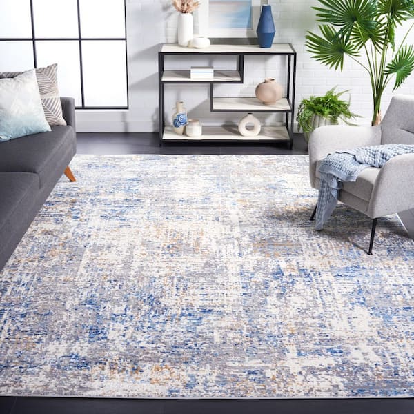 Shivan 8 ft. x 10 ft. Ivory/Blue Distressed Marle Area Rug