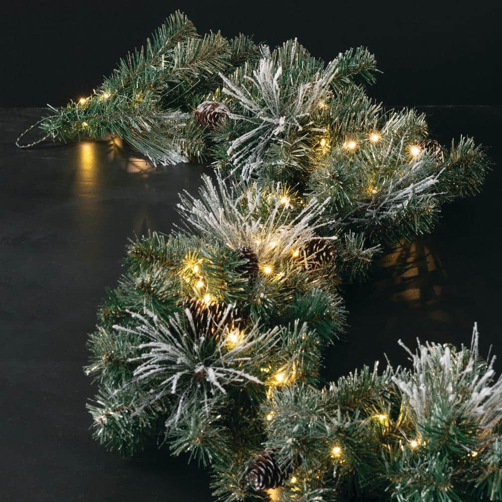 9-Foot Pre-lit Flocked Pine Christmas Garland with Pinecones and Gold Accents