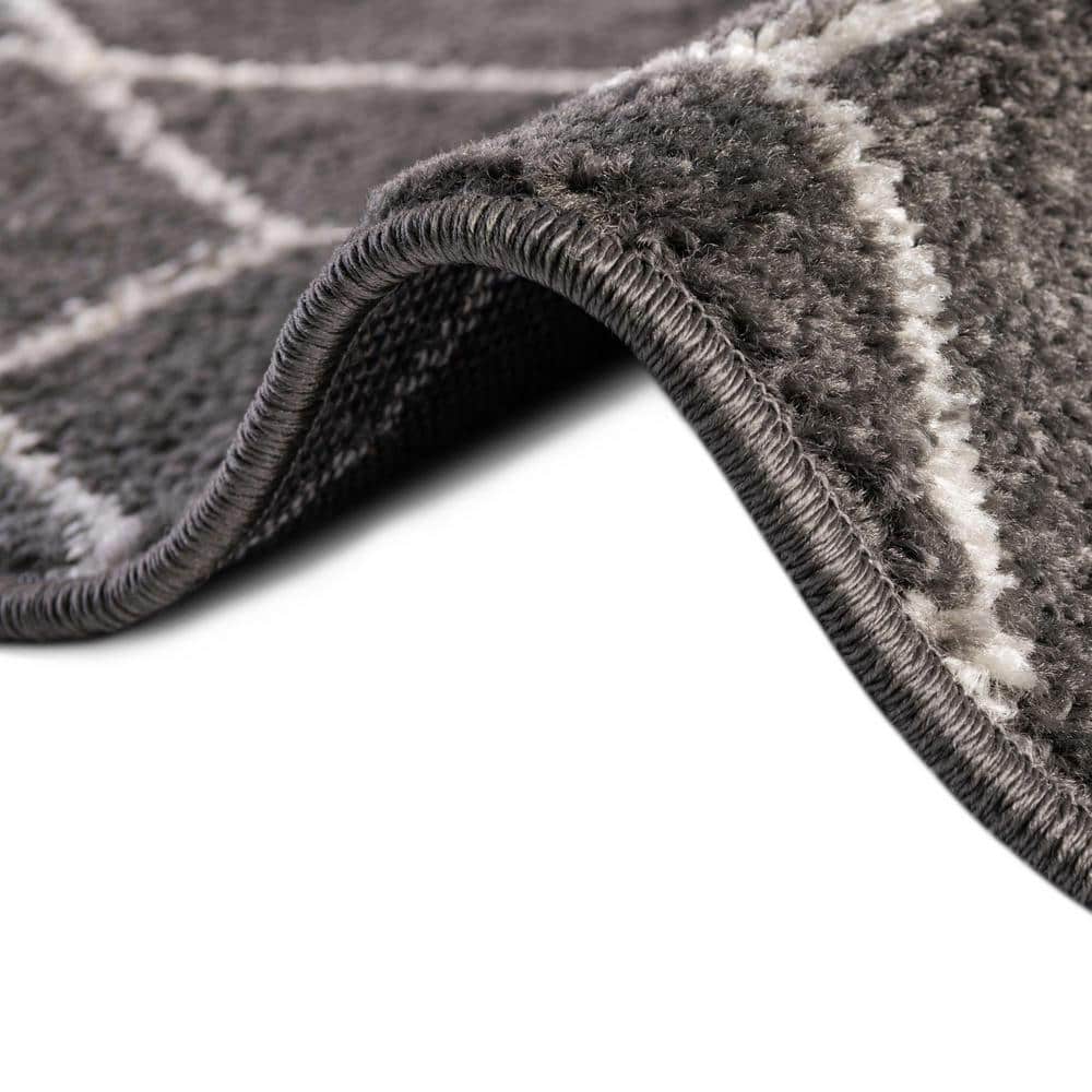 Trellis Frieze Dark Gray and Ivory Oval Synthetic Area Rug