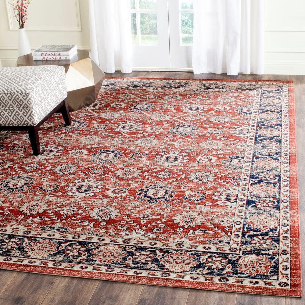 Handmade Ivory and Rust Rectangular 8' x 10' Synthetic Rug