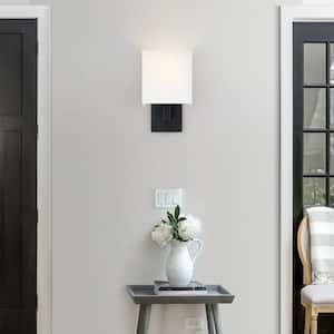 Celina 7 in. 1-Light Black Wall Sconce Light With White Fabric Shade