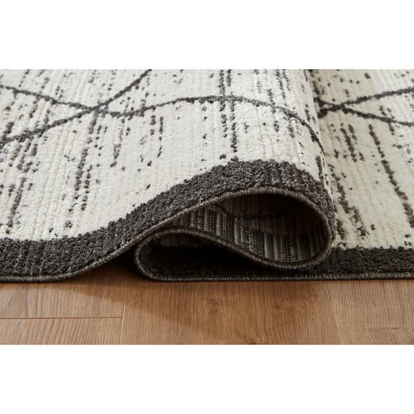 Fenriston 5 ft. x 7 ft. Black/Beige Geometric Area Rug