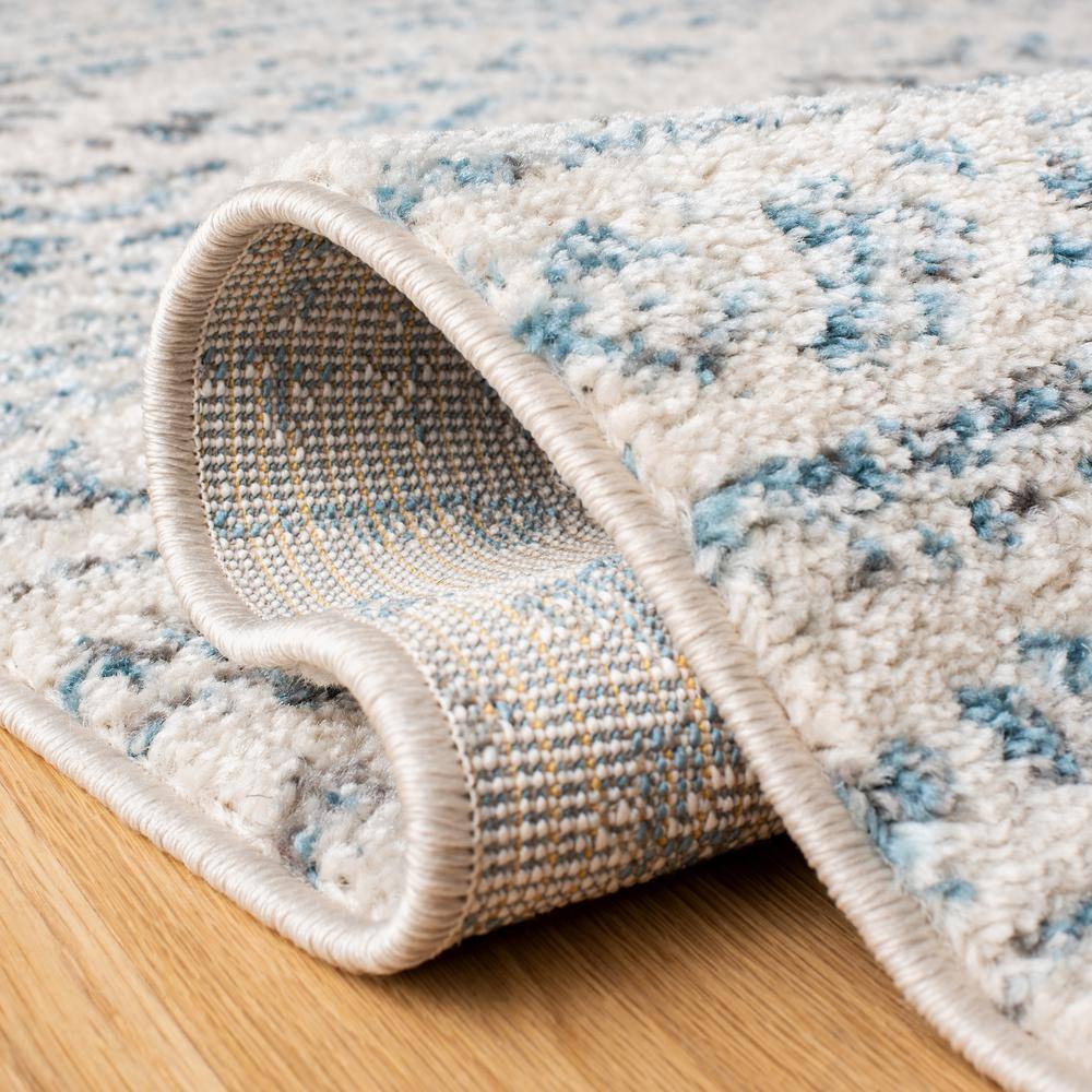 Ivory and Turquoise Geometric Hand-knotted Synthetic Area Rug
