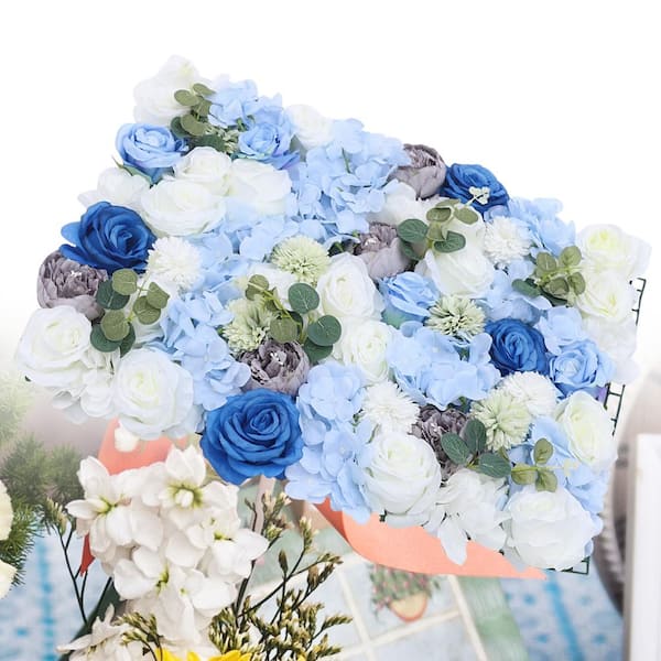 Delicate Bouquet of Roses Wrapped in Bright Floral Paper Stands on a Blue  Background. Stock Image - Image of plant, banner: 255145623