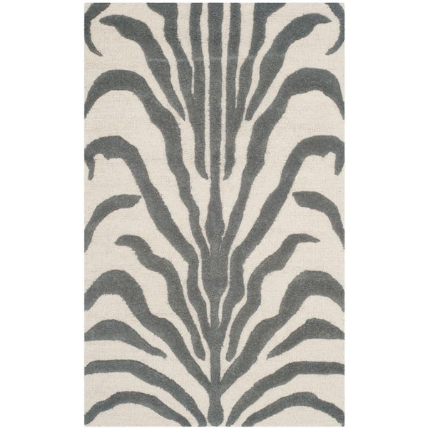 SAFAVIEH Cambridge Ivory/Dark Gray Doormat 2 ft. x 3 ft. Animal Print Area Rug