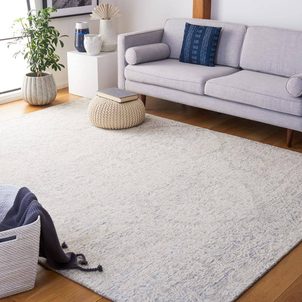 Ivory and Light Blue Floral Wool 8' x 10' Hand-Tufted Rug