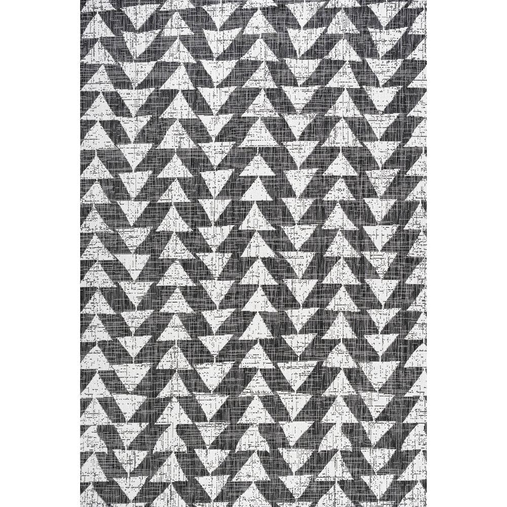 5' x 8' Black and Ivory Geometric Synthetic Area Rug