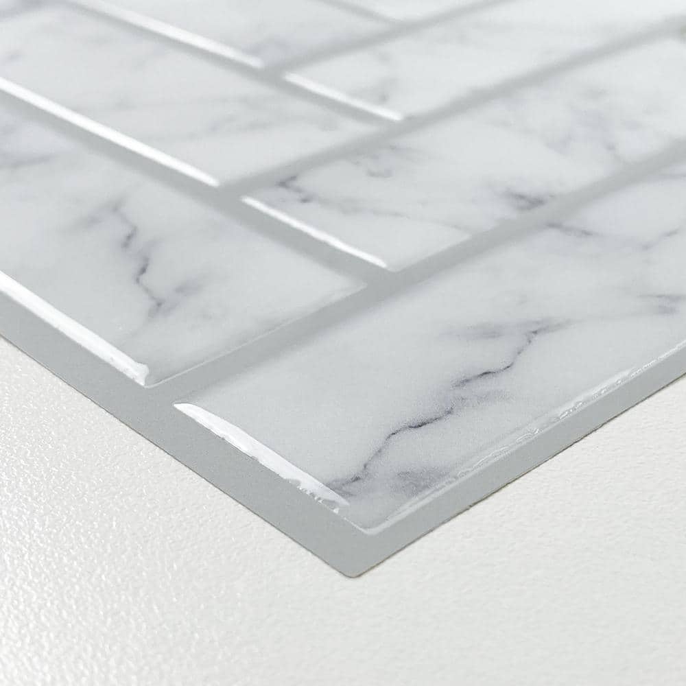 White Marble Herringbone Peel and Stick Vinyl Tile