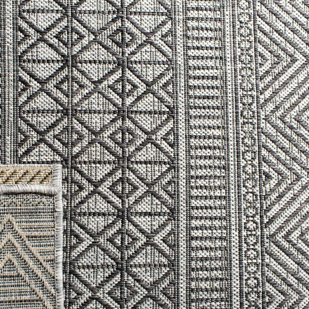 Reversible Black and Grey Synthetic Outdoor Rug, 9' x 12'