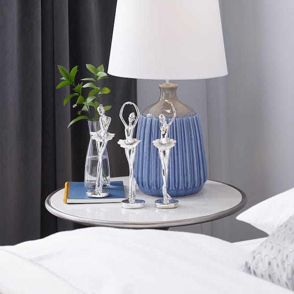 Litton Lane Caspian Silver 3 in. x 12 in. Polystone Dancer Sculpture with Capiz Inlay (Set of 3)