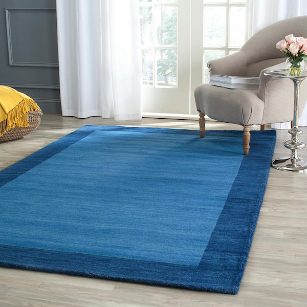 Himalaya Light Blue/Dark Blue 8 ft. x 10 ft. Border Area Rug