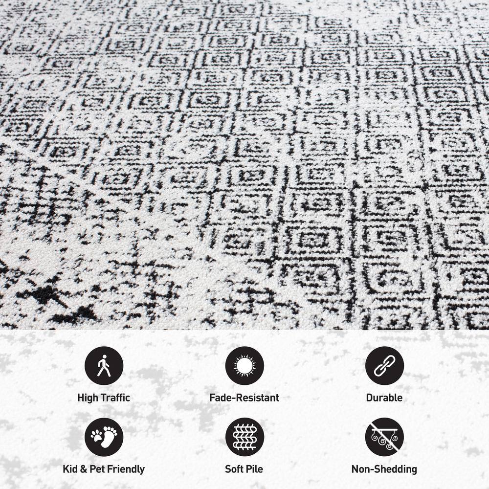 Black Geometric 5' x 7' Synthetic Easy Care Area Rug