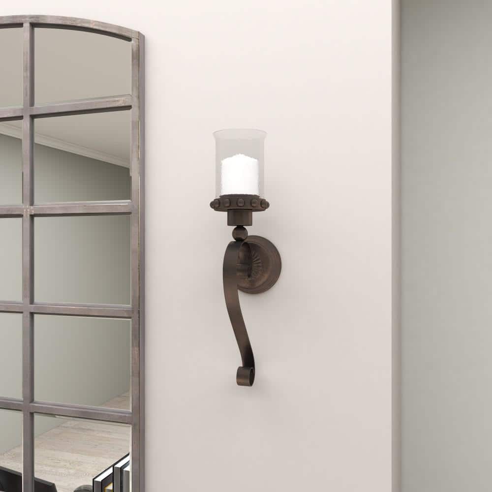 Brown Metal Scroll Wall Sconce with Glass Hurricane