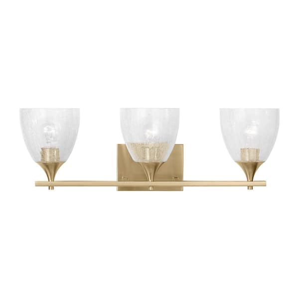 Generation Lighting - Toffino 26 in. W x 8.875 in. H 3-Light Satin Brass Modern Bathroom Vanity Light with Clear Crackle Glass Shades
