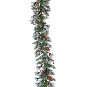 9 ft. L Pre Lit Glazier Pine Artificial Christmas Garland with Iced Tips Red Berries, 100 UL Clear LED Lights