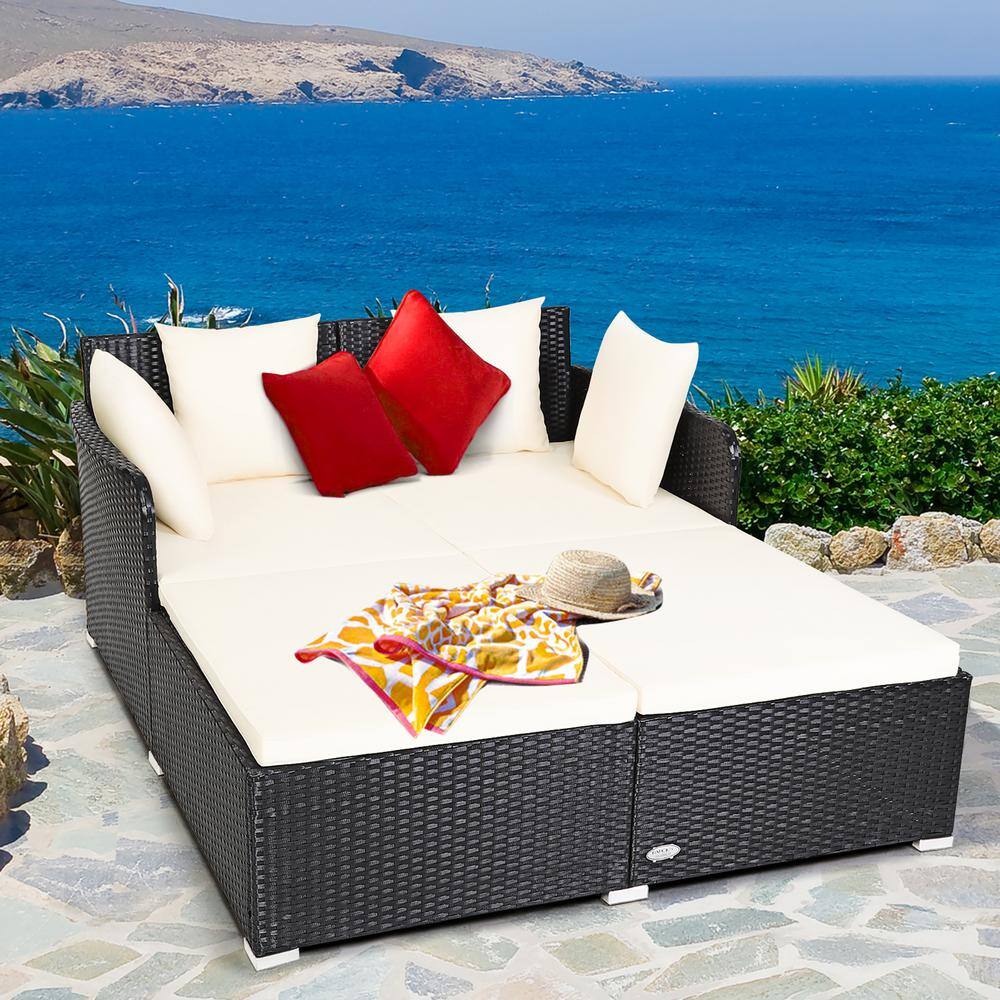 Beige Rattan Outdoor Daybed with Cushions and Pillows