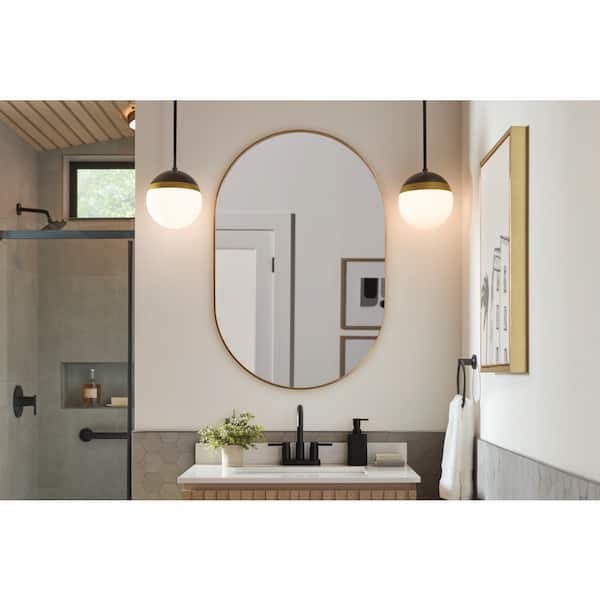 24 in. W x 36 in. H Oval Framed Wall Bathroom Vanity Mirror in Brushed Gold