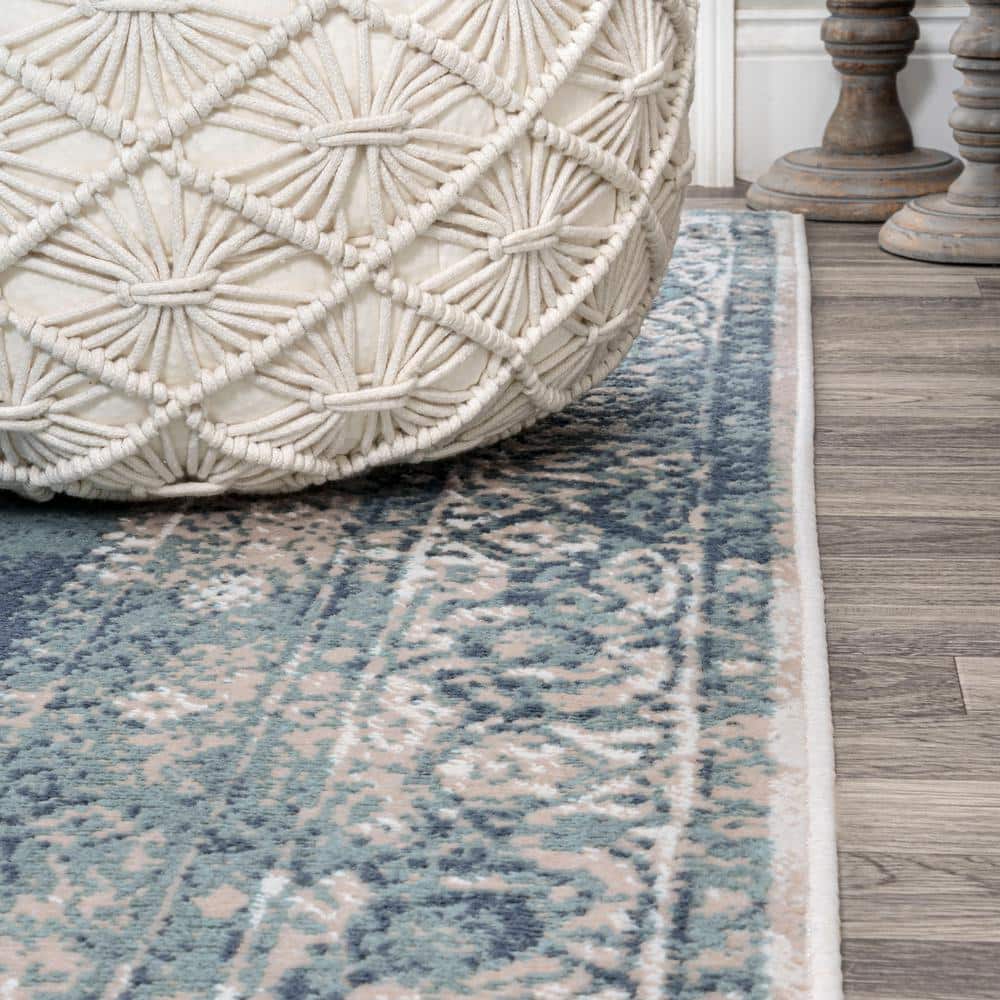 Ivory and Blue Medallion 8' x 10' Synthetic Area Rug