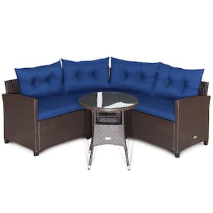 4-Piece PE Rattan Wicker Outdoor Furniture Sectional Set with Glass Table and Navy Cushions