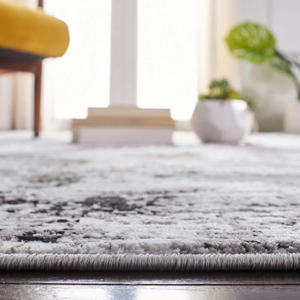 Amelia 9' x 12' Grey and Gold Synthetic Reversible Area Rug