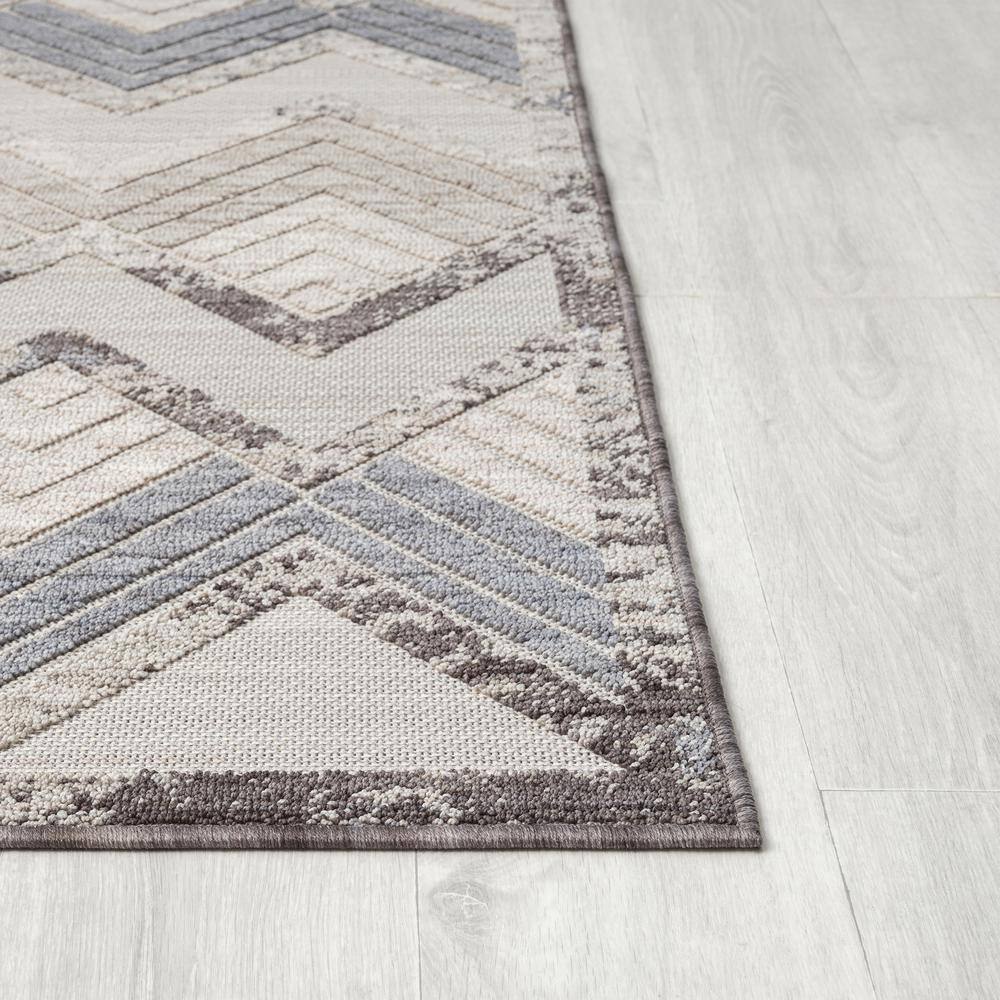 Winona Ivory Geometric 8' x 9' Synthetic Stain-Resistant Area Rug