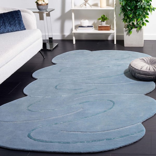 Novelty 2 ft. x 8 ft. Blue Solid Swirls Specialty Area Rug