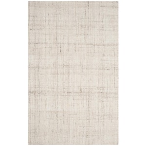 Abstract Ivory/Beige 6 ft. x 9 ft. Solid Area Rug