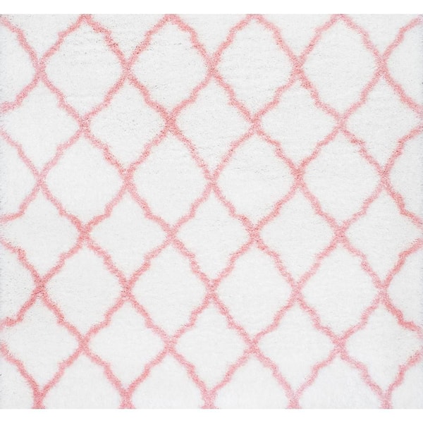 https://images.thdstatic.com/productImages/d0b28129-c5d3-467b-9201-08676b35292f/svn/baby-pink-nuloom-kids-rugs-ozas03b-s808-64_600.jpg