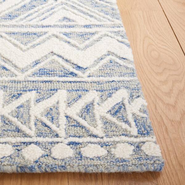 https://images.thdstatic.com/productImages/d0cf150e-1350-429e-a29f-aec39471f93a/svn/blue-ivory-safavieh-area-rugs-met908m-3-31_600.jpg