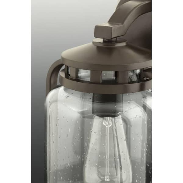Botta Collection 1-Light Antique Bronze Clear Seeded Glass Farmhouse Outdoor Large Wall Lantern Light
