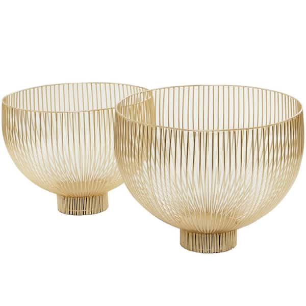 https://images.thdstatic.com/productImages/d0dc3b52-040d-5513-a93c-84276a1d9892/svn/metallic-gold-litton-lane-decorative-bowls-043616-e1_600.jpg