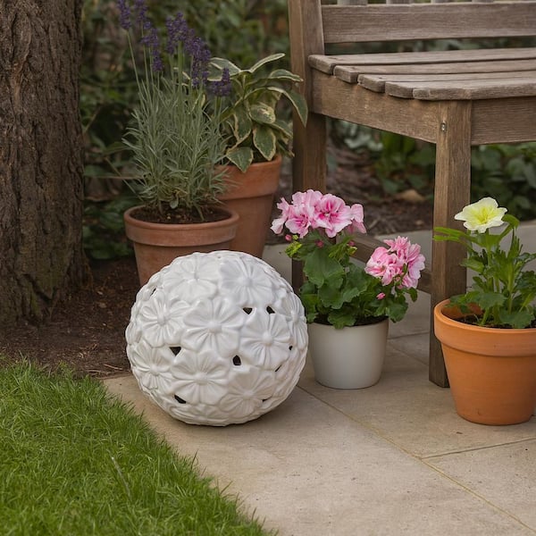 Liv & Skye 10 in. White Stoneware Flower Cut-out Orb Garden Statue