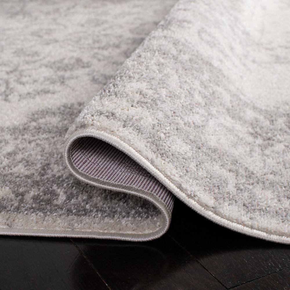 Ivory and Silver Square Synthetic Traditional Area Rug