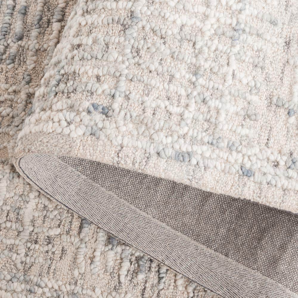 Handmade Light Blue and Ivory Abstract Wool Tufted Rug