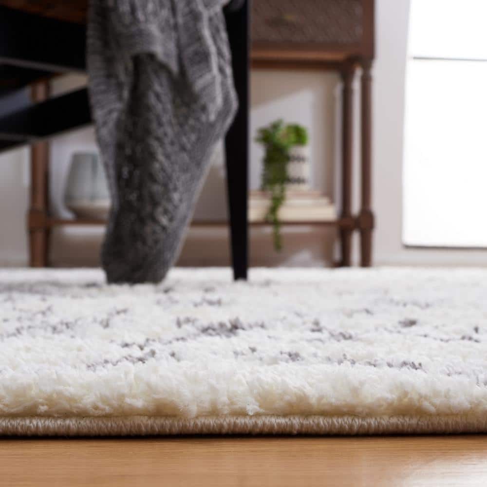 Cream and Light Grey 8' x 10' Shag Synthetic Area Rug