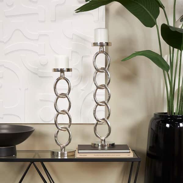Litton Lane Silver Aluminum Geometric Candle Holder (Set of 2)