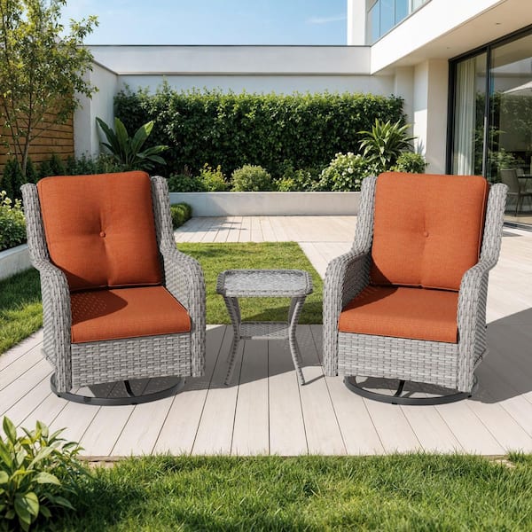 3-Piece Gray Wicker Patio Conversation Set Swivel Rocking Chair with Orange Cushions and Table