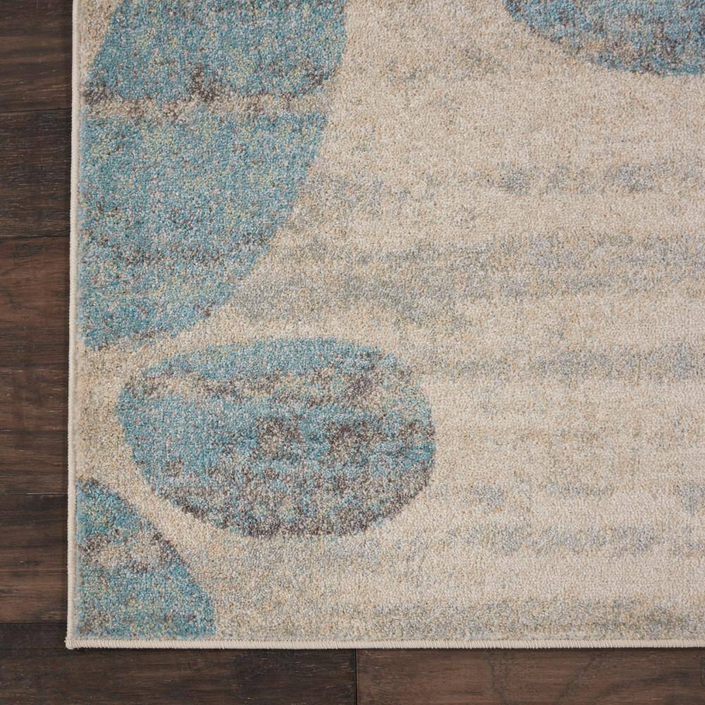 Ivory and Light Blue Floral Synthetic 8' x 10' Area Rug