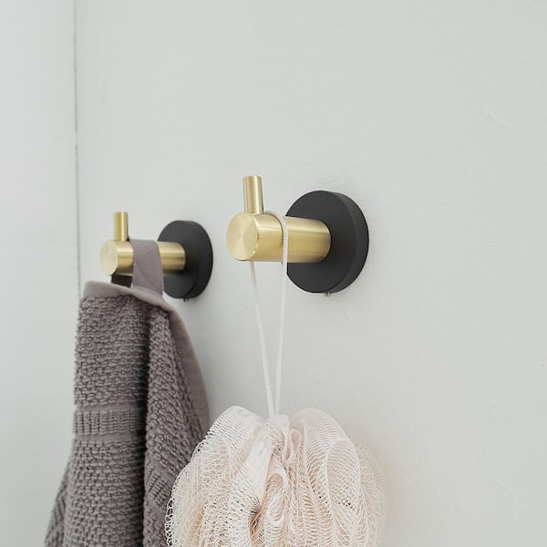 https://images.thdstatic.com/productImages/d16ec389-d657-4413-bd17-5f338a034f50/svn/gold-black-bwe-bathroom-hardware-sets-a-91013-s-gb-1-77_600.jpg