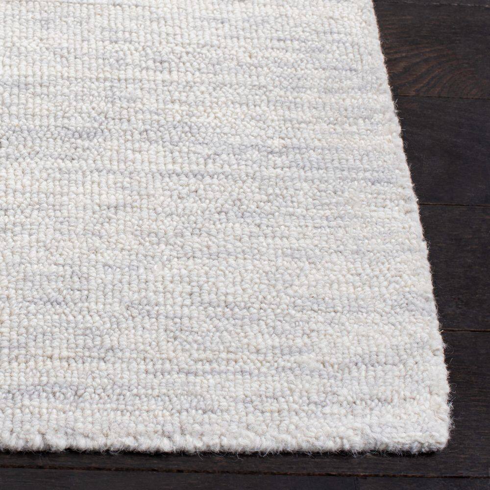Ivory Hand-Tufted Wool 8' x 10' Area Rug