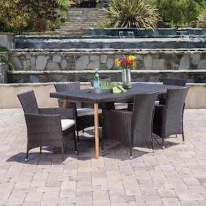Carpinteria Multibrown 7-Piece Faux Wicker Rectangular Outdoor Dining Set with Beige Cushions